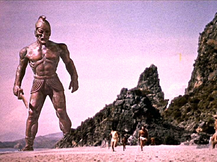 Talos towering over figures on a beach