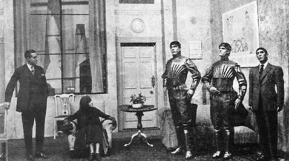 A scene from the play, showing three robots